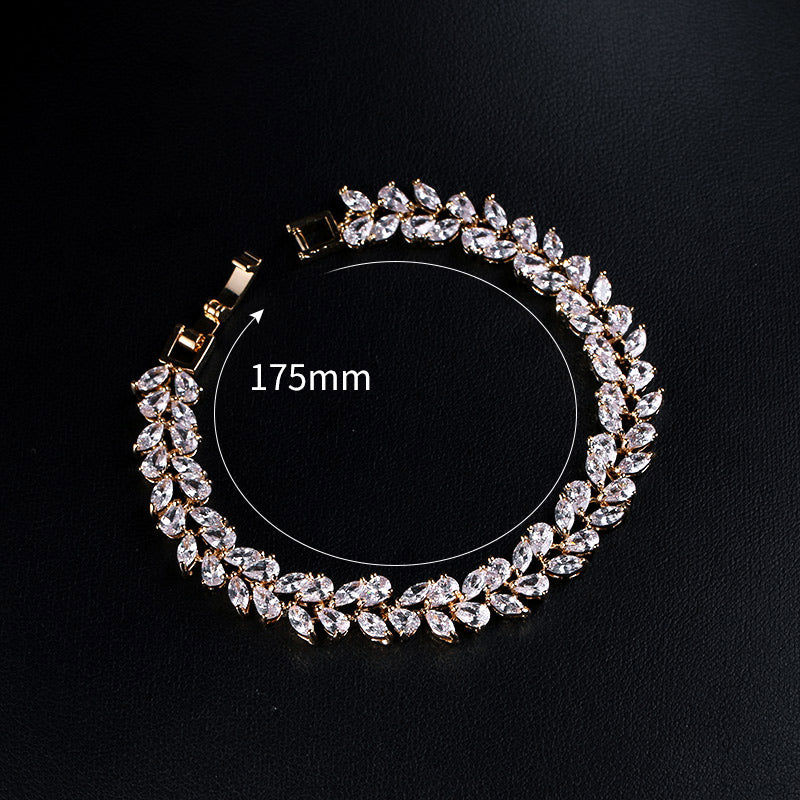 Gold and Platinum Marquise Tennis Bracelet