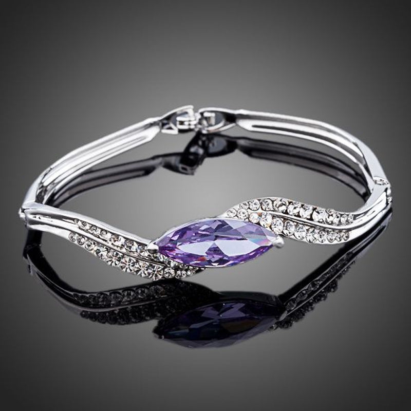 Platinum plated stellux crystal stone curved ladies diamond bracelet