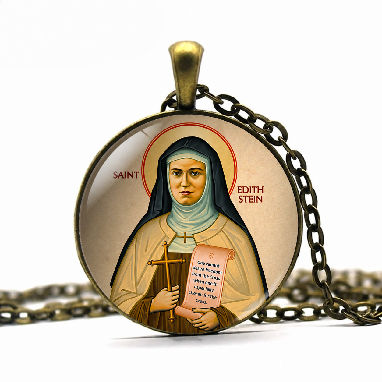 Pendant with a depiction of Saint Edith Stein holding a cross and a book, on a white background.