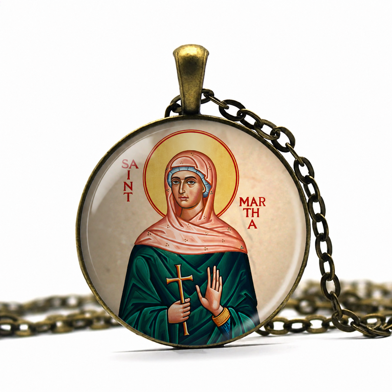 Pendant with illustration of Saint Martha and chain on a white background