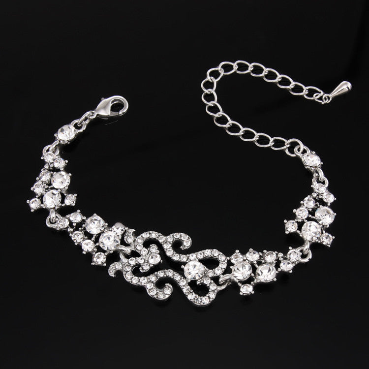 Elegant silver women’s bracelet with crystal motifs