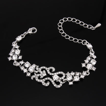 Elegant silver women’s bracelet with crystal motifs