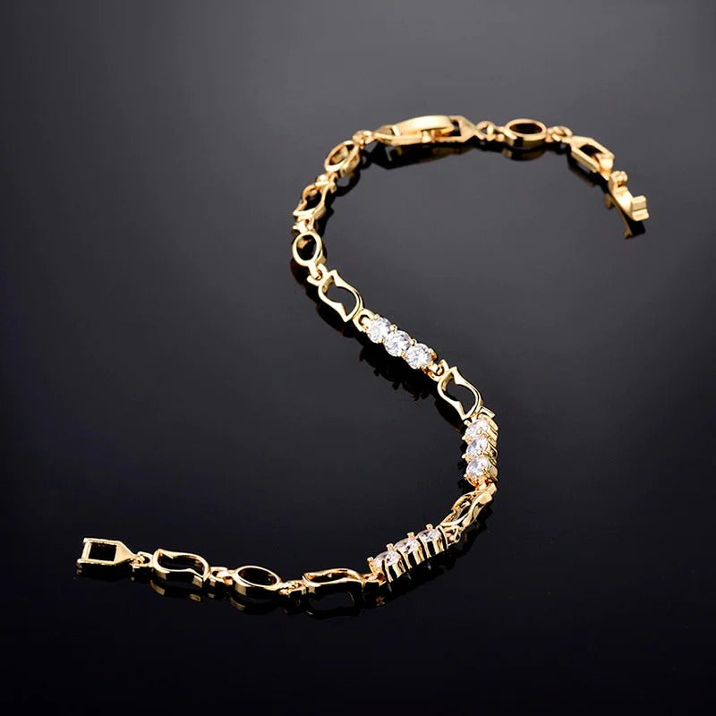Elegant ladies bracelet with gold drop zircon stones
