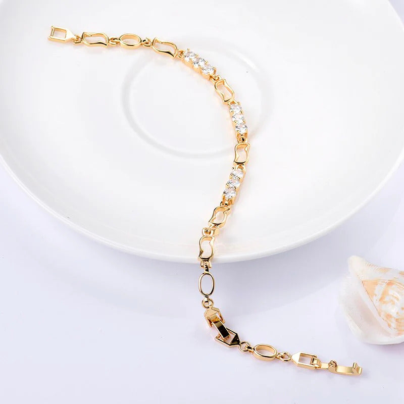 Elegant ladies bracelet with gold drop zircon stones