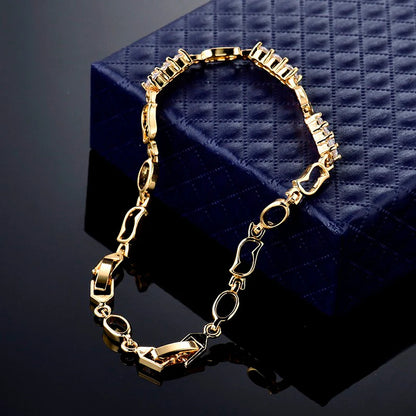 Elegant ladies bracelet with gold drop zircon stones