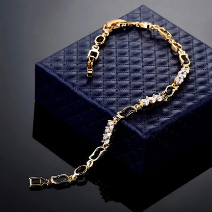 Elegant ladies bracelet with gold drop zircon stones