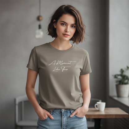 Brown t-shirt with 'A Moment Like This' text on a white background