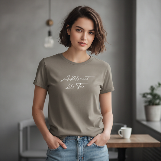 Brown t-shirt with 'A Moment Like This' text on a white background