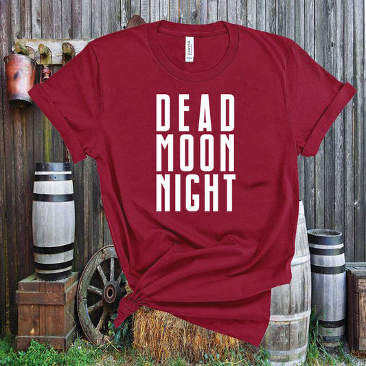 Red t-shirt with 'DEAD MOON NIGHT' text against a rustic wooden background