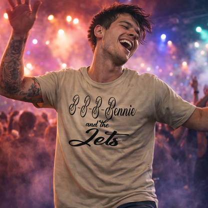 Man wearing a 'B-B-B Bennie and the Jets' t-shirt with a colorful, blurred background
