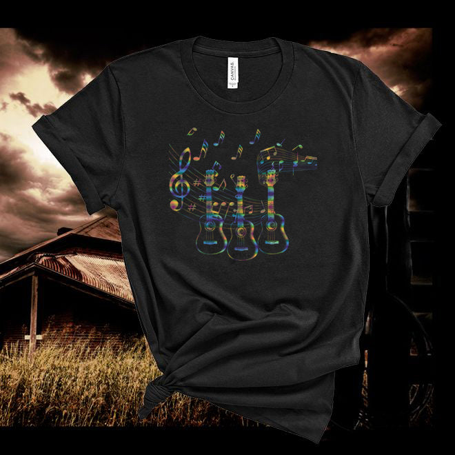 Black t-shirt with colorful guitar and note design against a rustic background