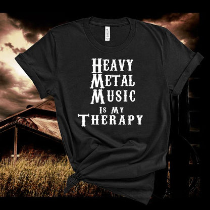 Black t-shirt with 'Heavy Metal Music is My Therapy' text against a rustic background