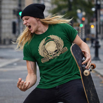 Person wearing a green t-shirt with a skull design, holding a skateboard on an urban street.