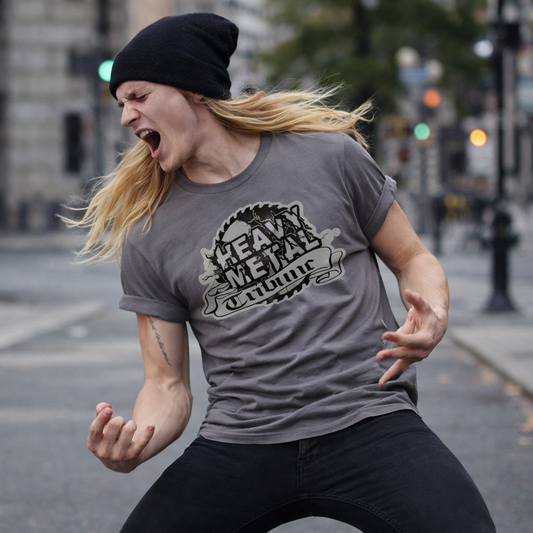 Person wearing a gray t-shirt with a graphic design, running on a city street.