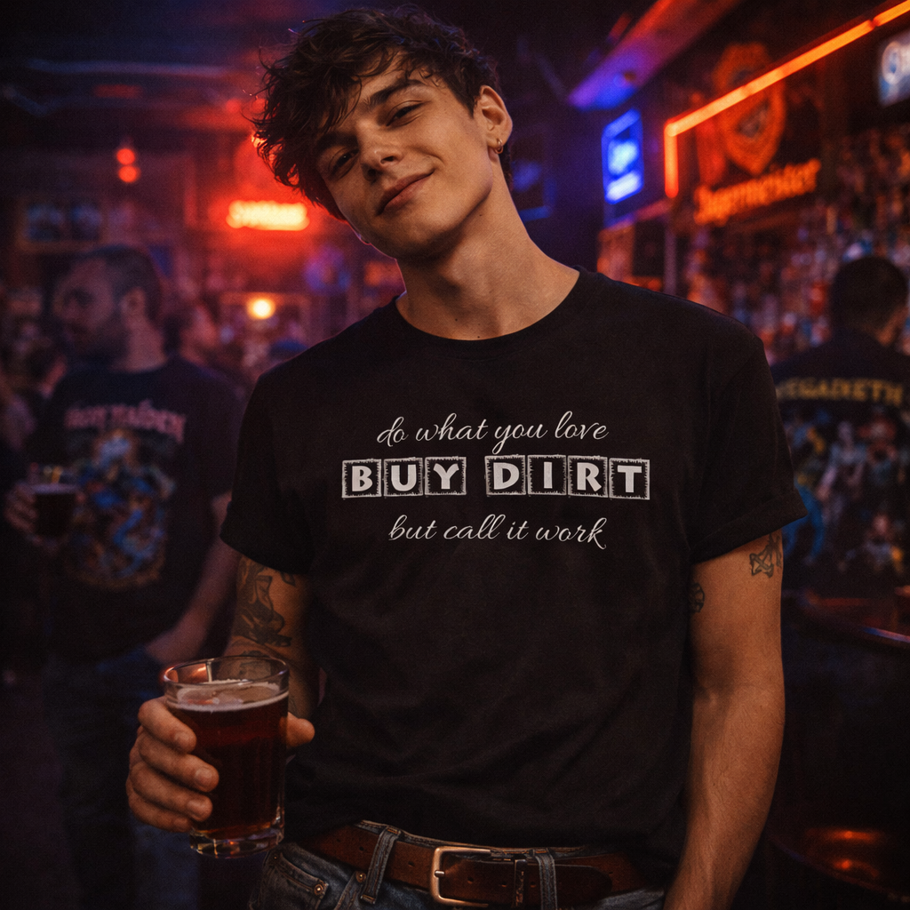 Person wearing a black t-shirt with text in a bar setting