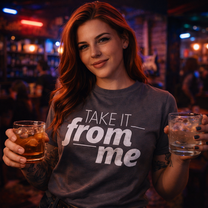 Woman wearing a t-shirt with 'Take it from me' in a bar setting