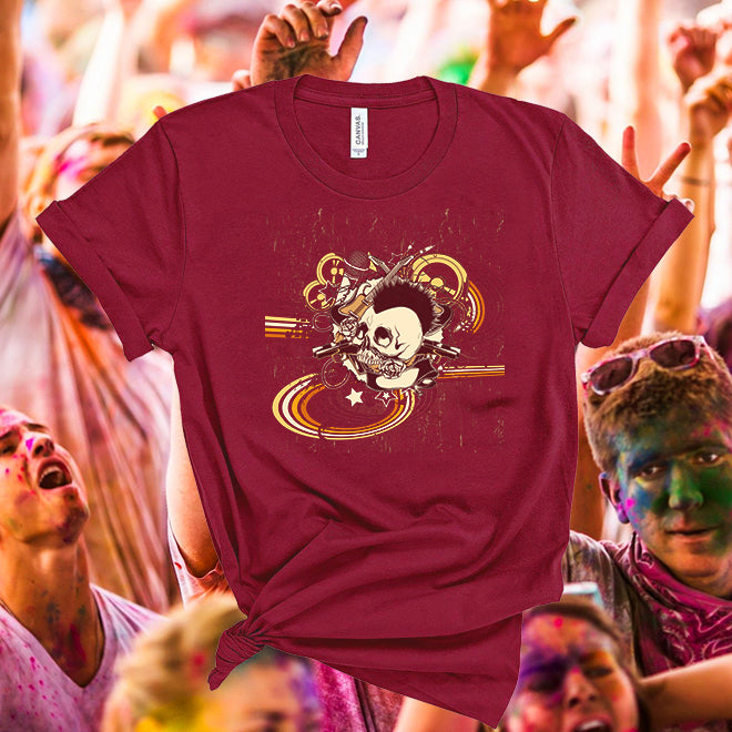 Maroon t-shirt with skull design held by a person in a crowd