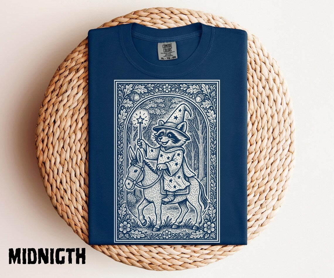 Raccoon Wizard Riding Donkey Shirt, Medieval Linocut Illustration, Fairytale Storybook Style, Whimsical Quirky Fantasy Animal Tee - Denoss