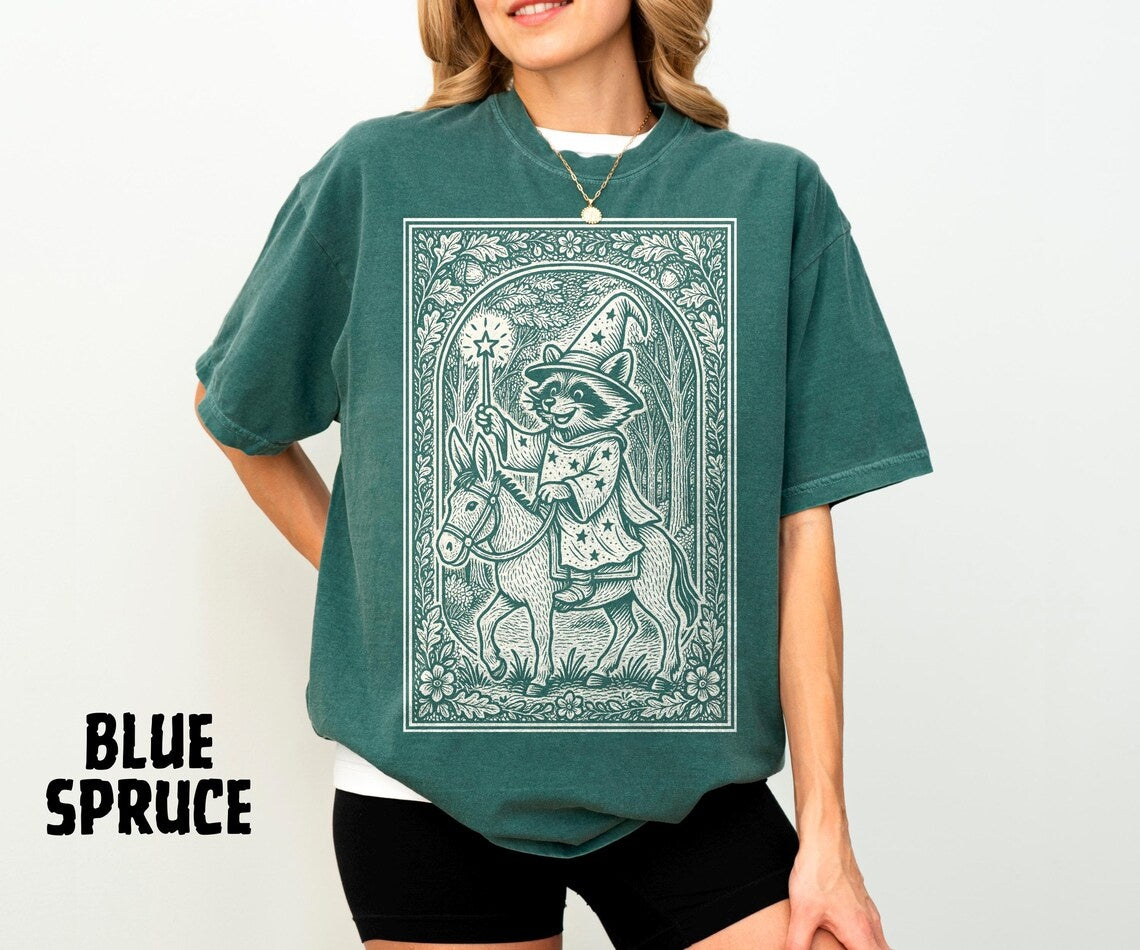 Raccoon Wizard Riding Donkey Shirt, Medieval Linocut Illustration, Fairytale Storybook Style, Whimsical Quirky Fantasy Animal Tee - Denoss