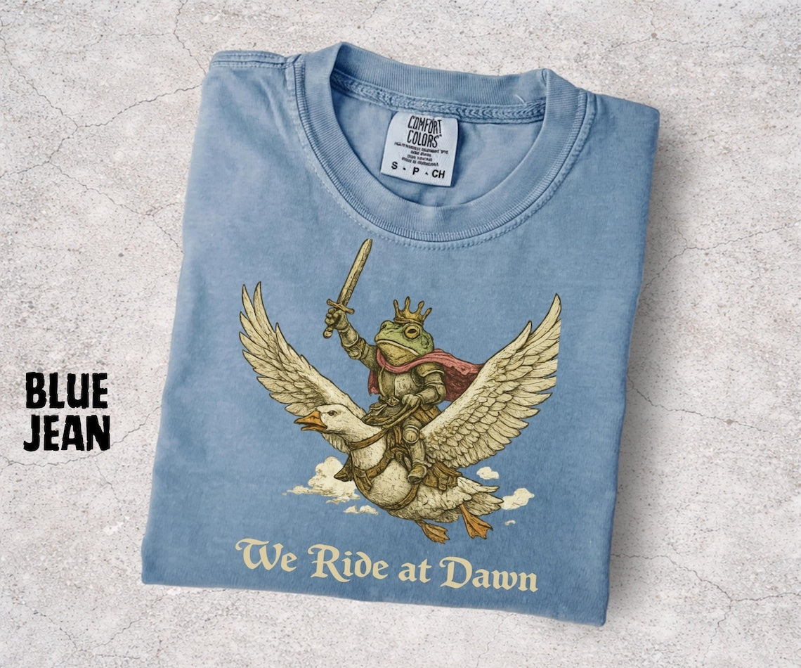 We Ride at Dawn Shirt, Medieval Frog Knight Riding Goose, Chaotic Frog Meme Tee, Funny Fantasy Shirt, Frog Lover Gift - Denoss